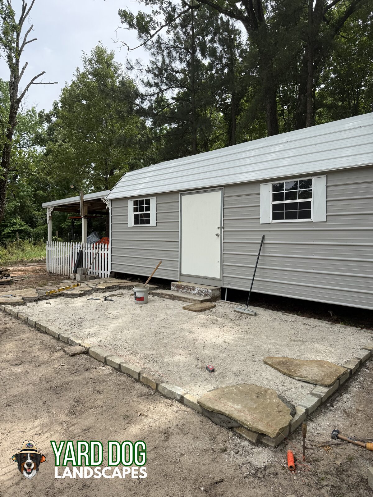 Crushed stone base laid and leveled for a flagstone patio in East Texas