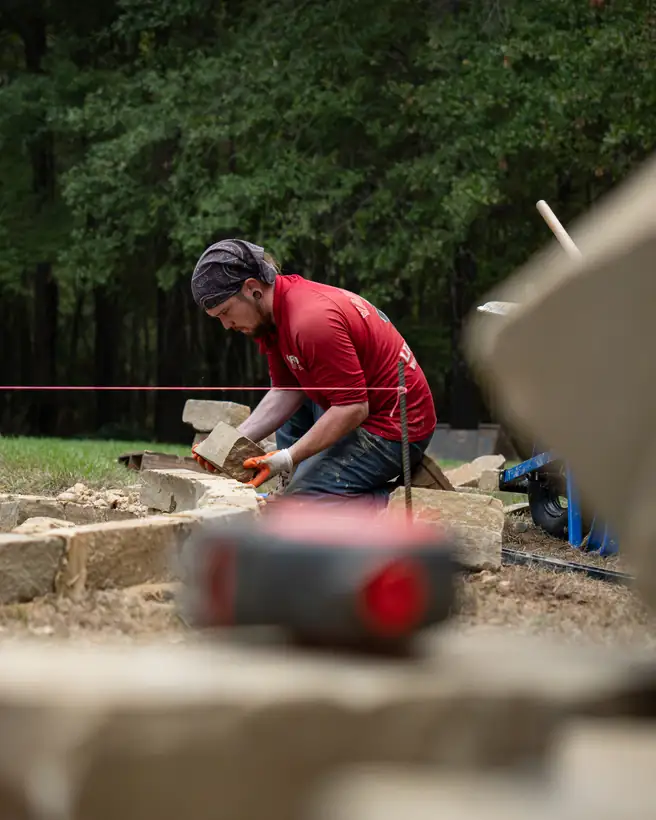 Setting border stones to a string line, Hallsville, TX