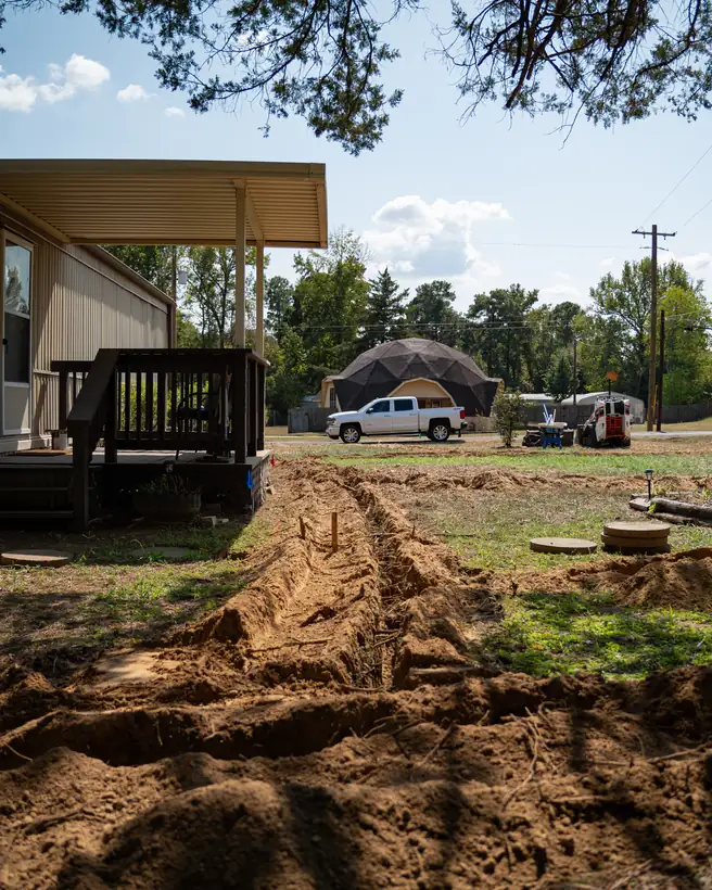 Trench along the side yard, Longview, TX