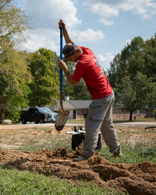 Digging a trench by hand, Longview, TX