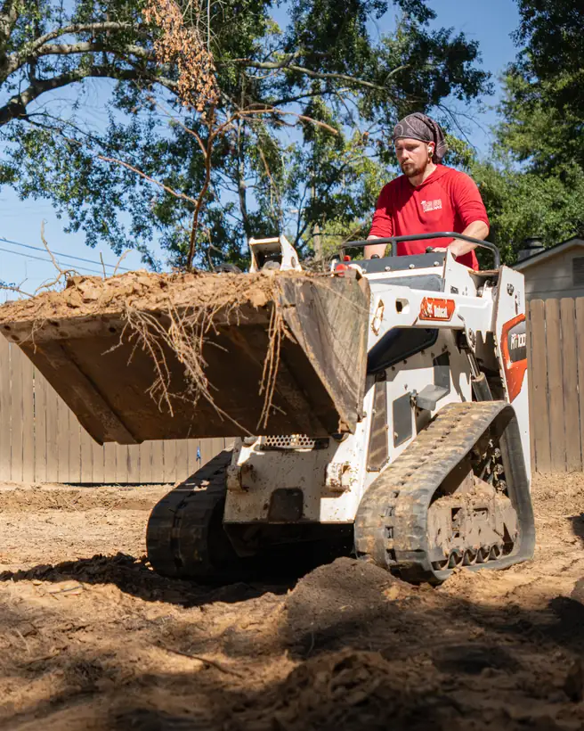 Grading the backyard before sod, Longview, TX
