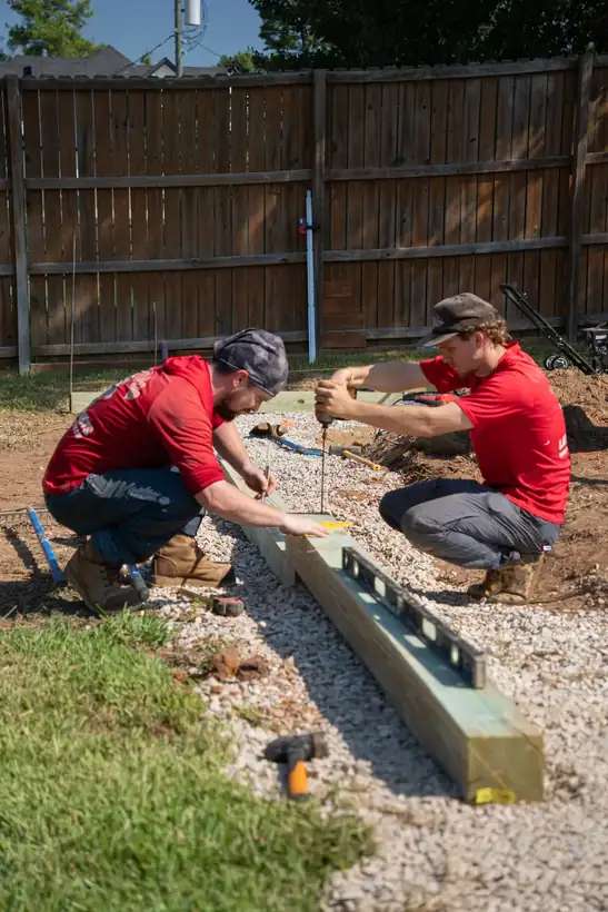 Cutting pressure-treated timbers, White Oak, TX