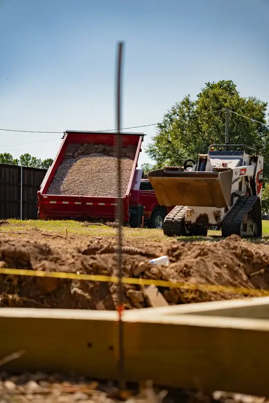 Dump truck and timbers on site, White Oak, TX