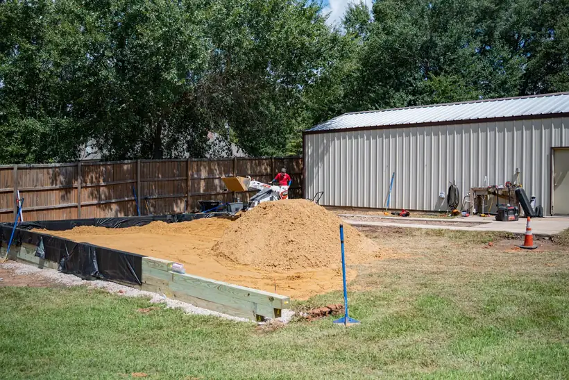 Pad filled and compacted inside the timber wall, White Oak, TX