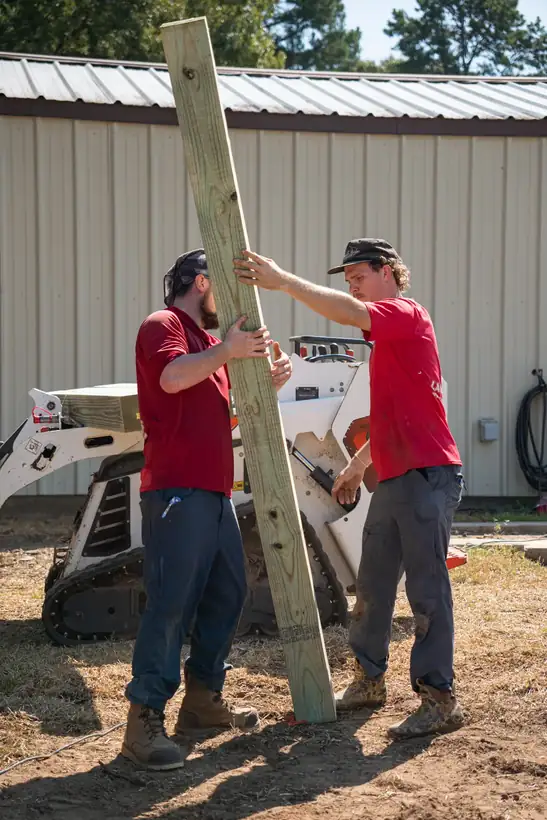 Standing a timber into place, White Oak, TX