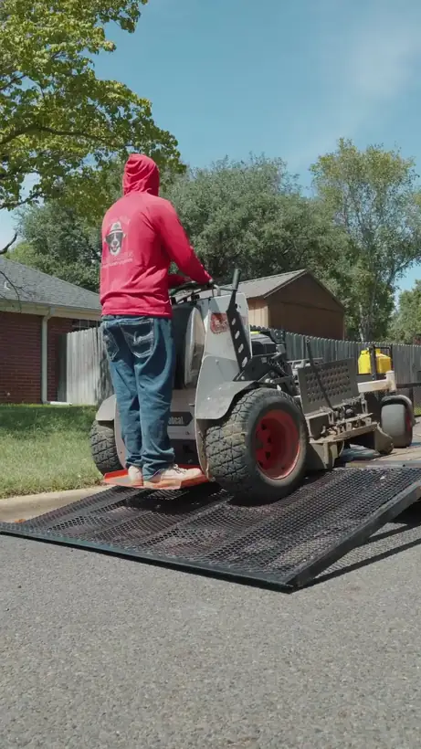 Unloading the stand-on mower, East Texas