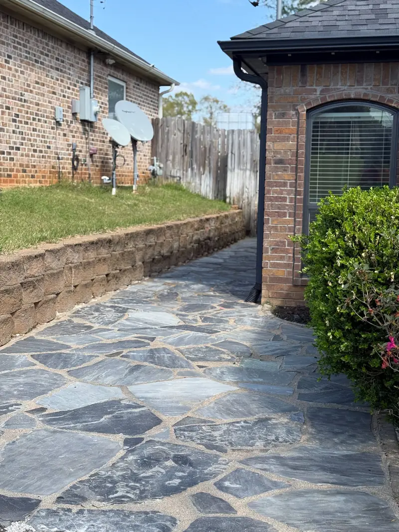 Flagstone walk with a low block wall, East Texas
