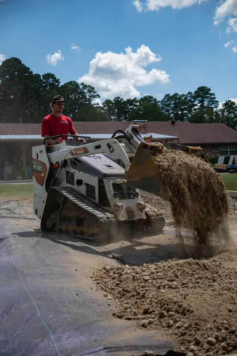 Loader dropping gravel on the pad, White Oak, TX